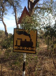 Leaving Mabalauta the railroad is crossed prior to reaching the main road.