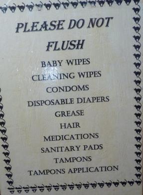 The sIgn from the Third Bridge tent. Do people really throw all this down the toilet?