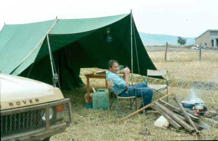 Our camp at Mbita Point. The chicken and potatoes boil while Matt relaxes.